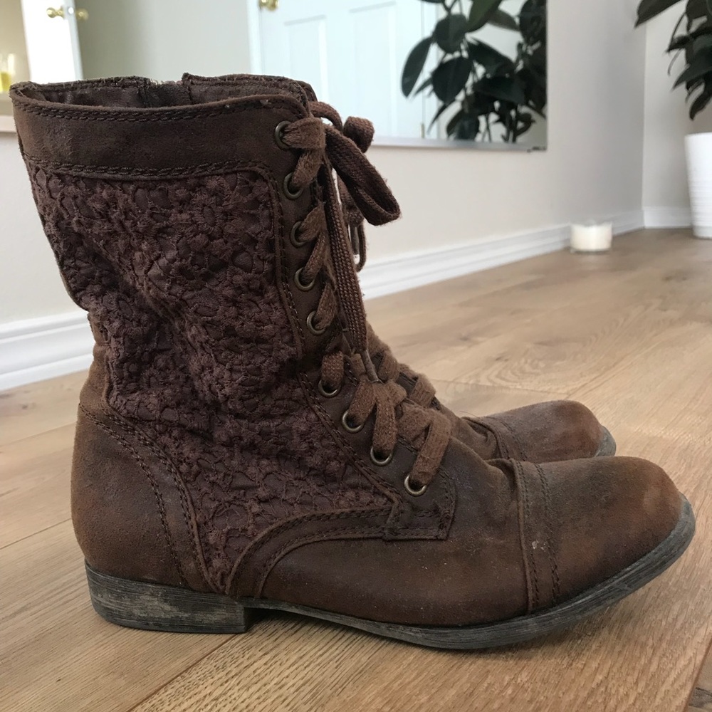 Lace up boots with zippers